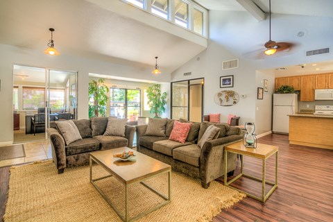 a living room with a couch and a table